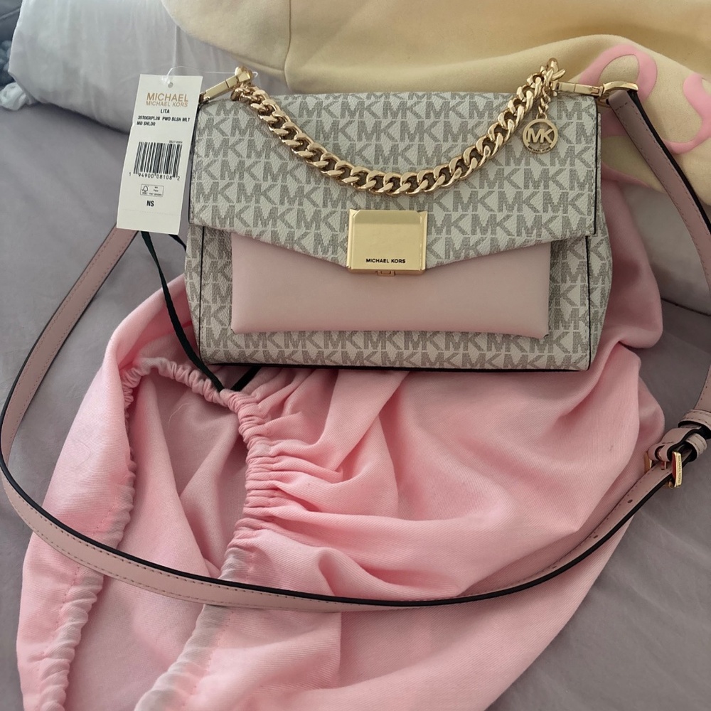 Michael Kors, small leather crossboy brand new with tags